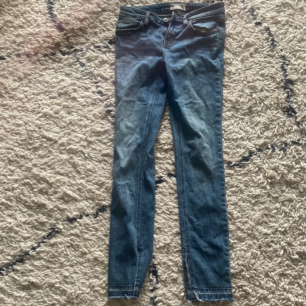 Free people jeans small slit at pant leg great for boots